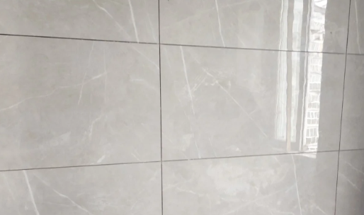 粘一平方墙瓷砖要多少水泥