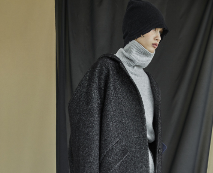 澳毛大衣厚的好还是薄的好