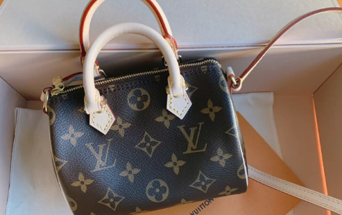 lv中国官网买的包可以到专柜换吗