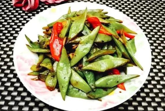 刀豆要炒多久才会熟刀豆生吃会中毒吗(刀豆生炒好吃吗)