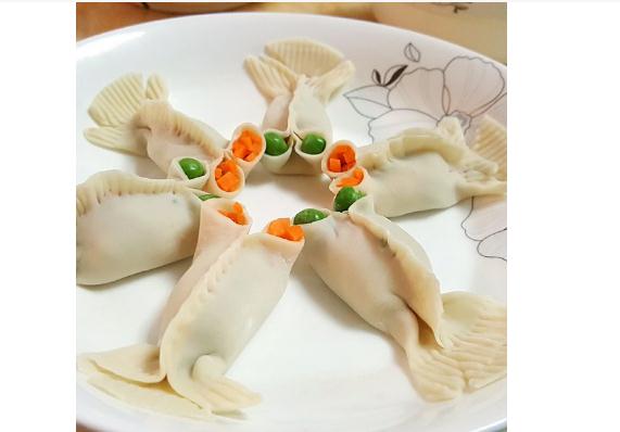 过年吃各种饺子馅有什么寓意酸菜饺子馅怎么做好吃(包饺子的酸菜是什么样的)